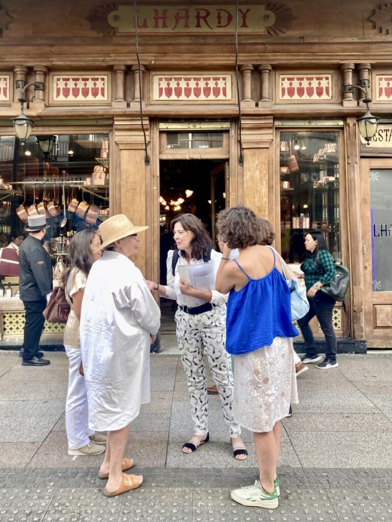 Guide Eugenia explaining to a group of travelers